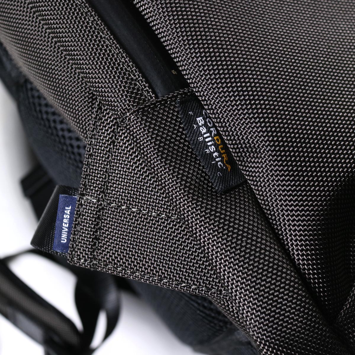 UNIVERSAL PRODUCTS / NEW UTILITY BAG (Charcoal)ネームタグ
