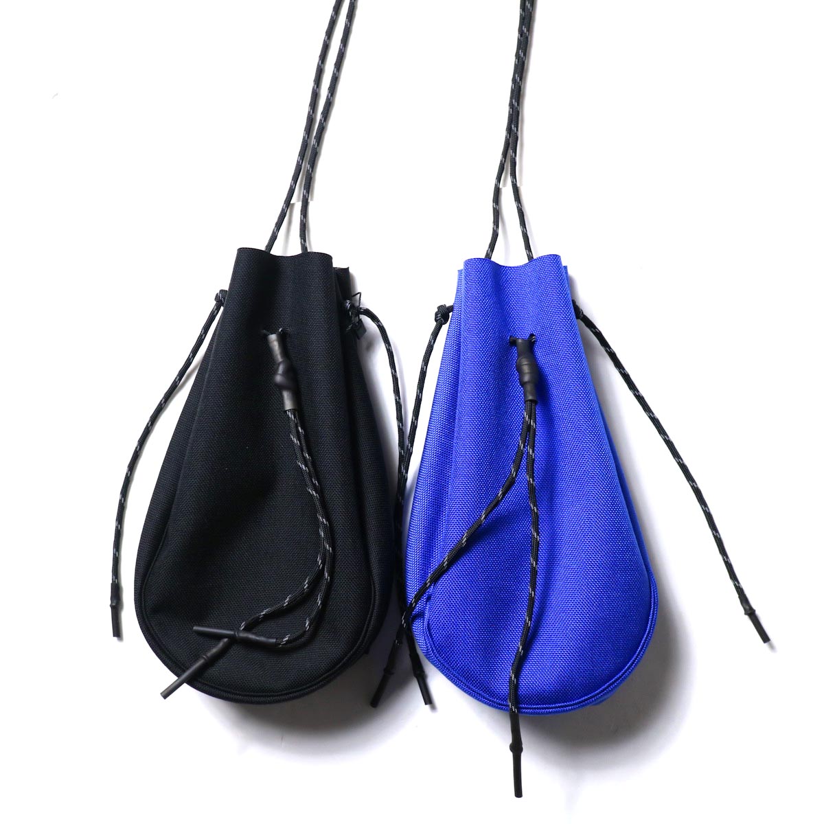 吉岡衣料店 / drawstring bag -S-. (左：Black / 右:Blue)