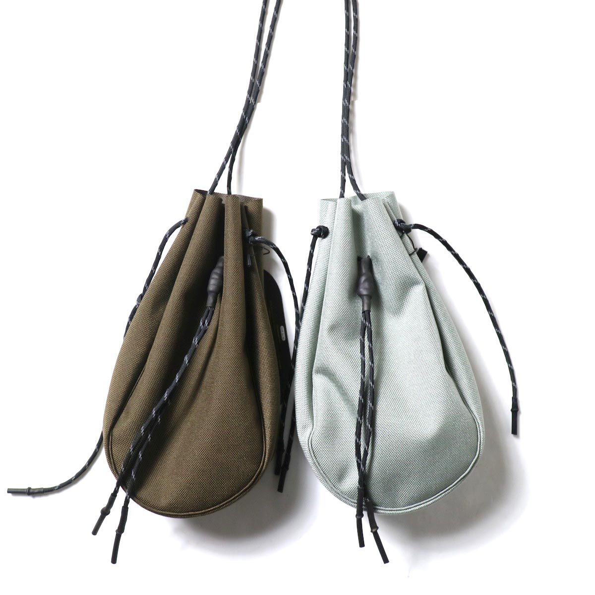 吉岡衣料店 / drawstring bag -S-. (左：Brown / 右:gray)