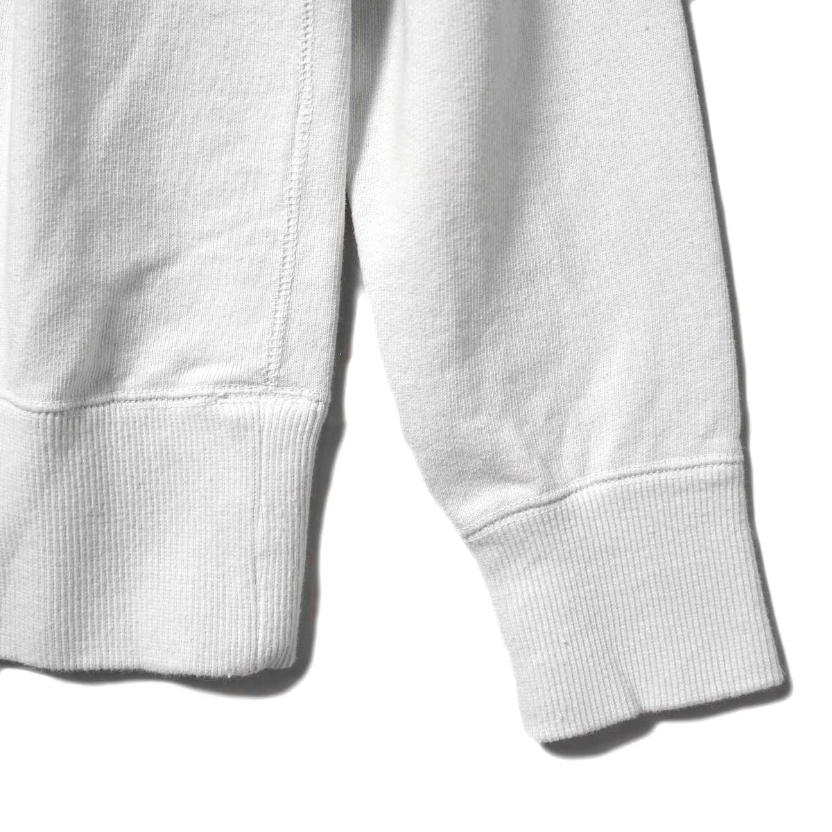 HTS / PRINT SWEAT SHIRT (Mineral White×Off Black) 袖・裾