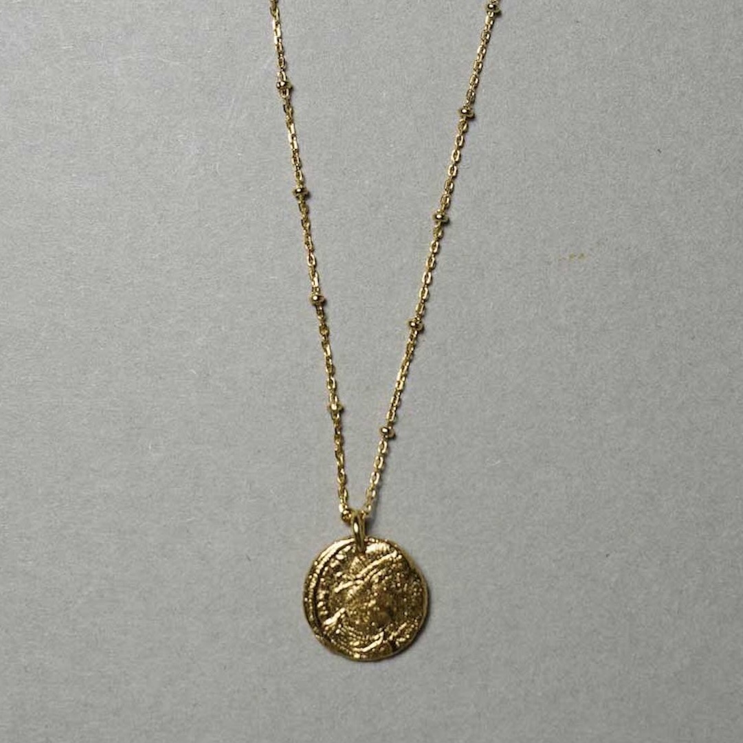 on the sunny side of the street / Victory Godness Nikke Coin Necklace (Gold) 正面
